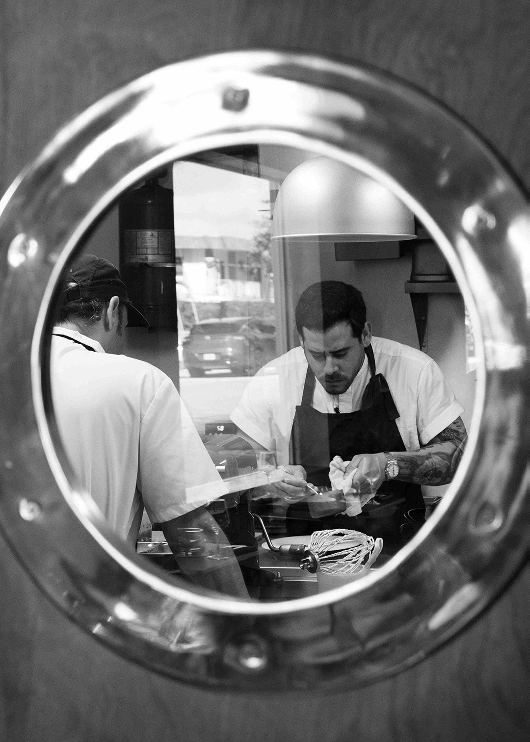TBD chefs working in the ktichen.
