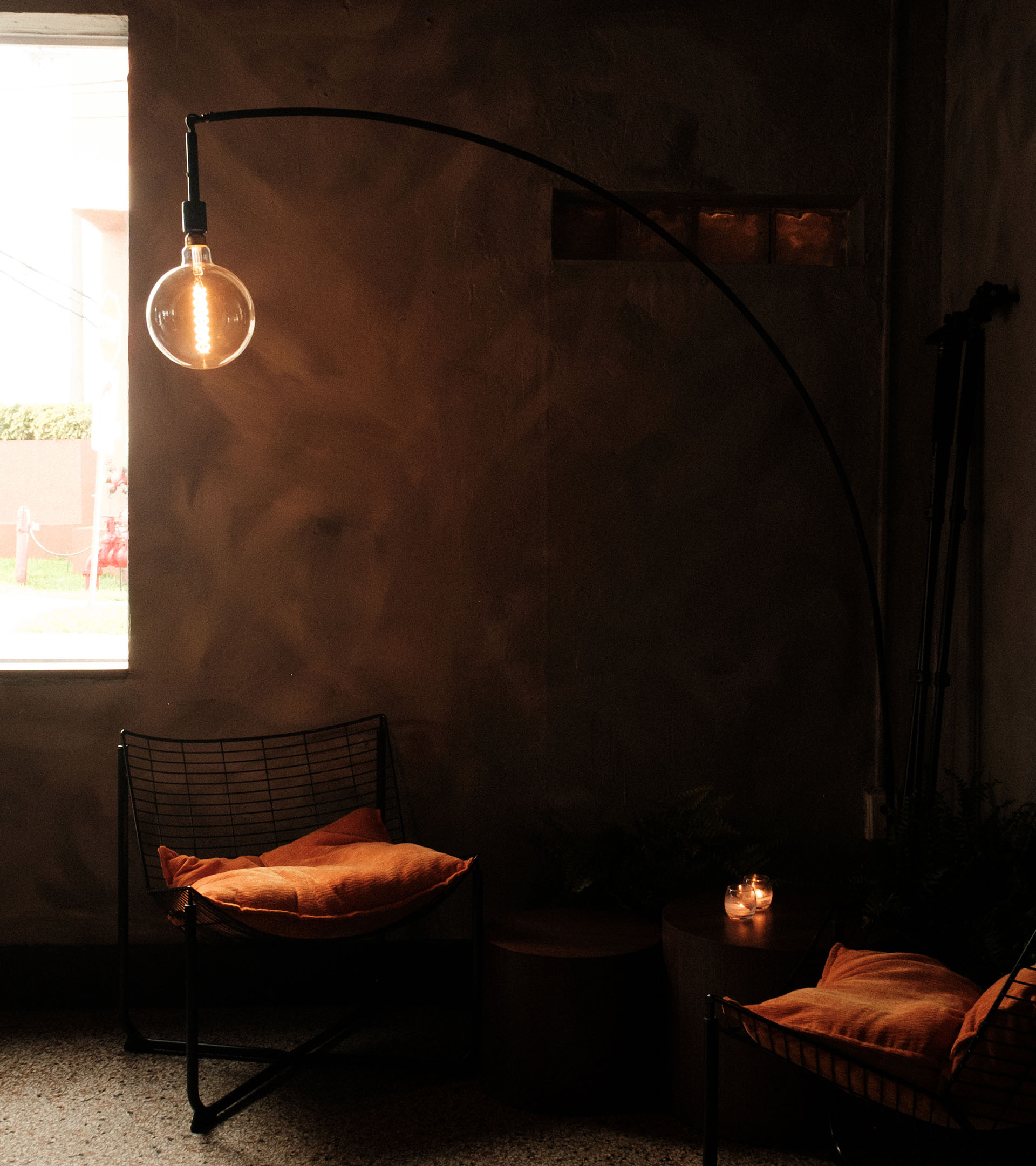 One of the TBD seating spaces to chill out with a dark cozy light.